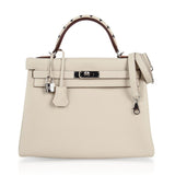 Limited Edition Kelly 32 Retourne Bag Au Galop Craie Togo Leather with Palladium Hardware